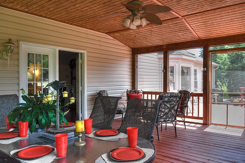 screened porch with citronella candles