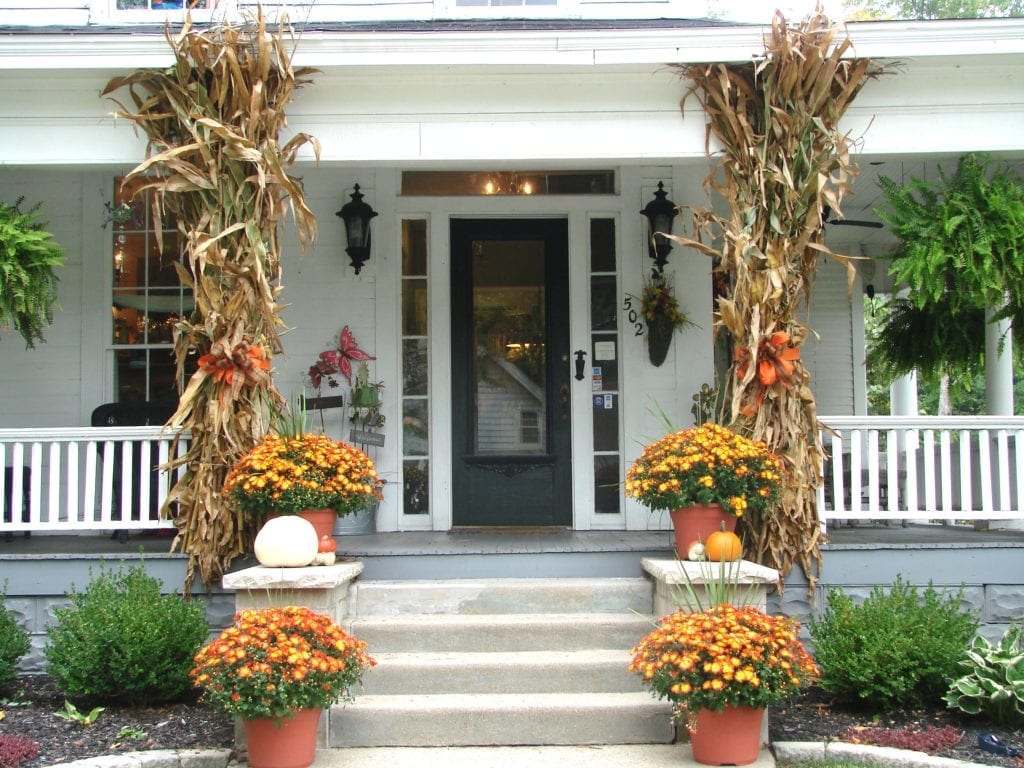 decorated fall front porch on custom home.